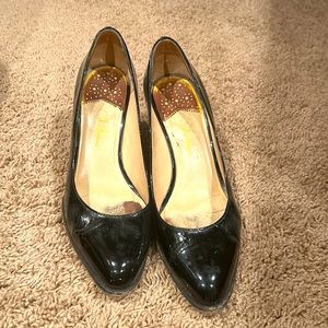 Call Haan Nike air black patent pumps